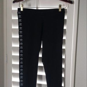 Full length black Adidas tape leggings